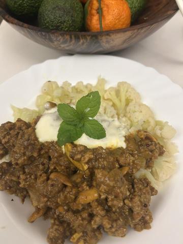 Heidi Soo - Beef korma on a bed of cauliflower rice topped with raita, great ketogenic meal