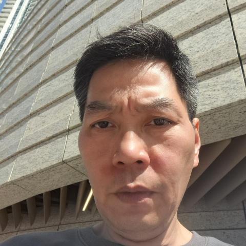 提供磁磚服務的專家John SHUM
